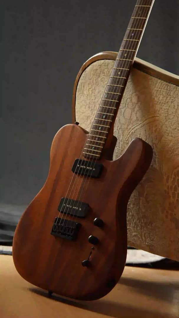 A beautiful custom made mahogany guitar in telecaster style.